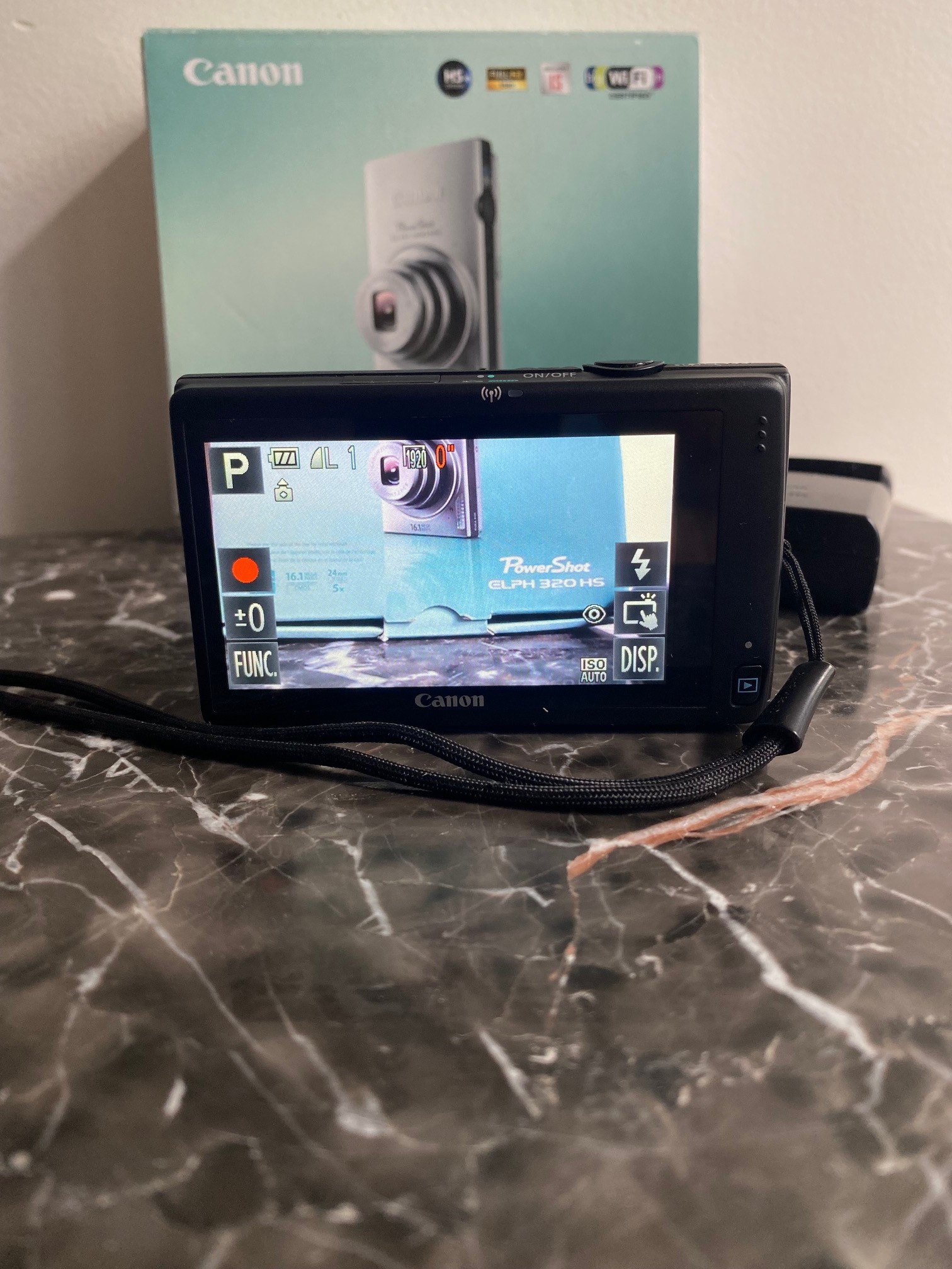Like New Canon PowerShot ELPH 320 HS Digital Camera In Box - photo 4