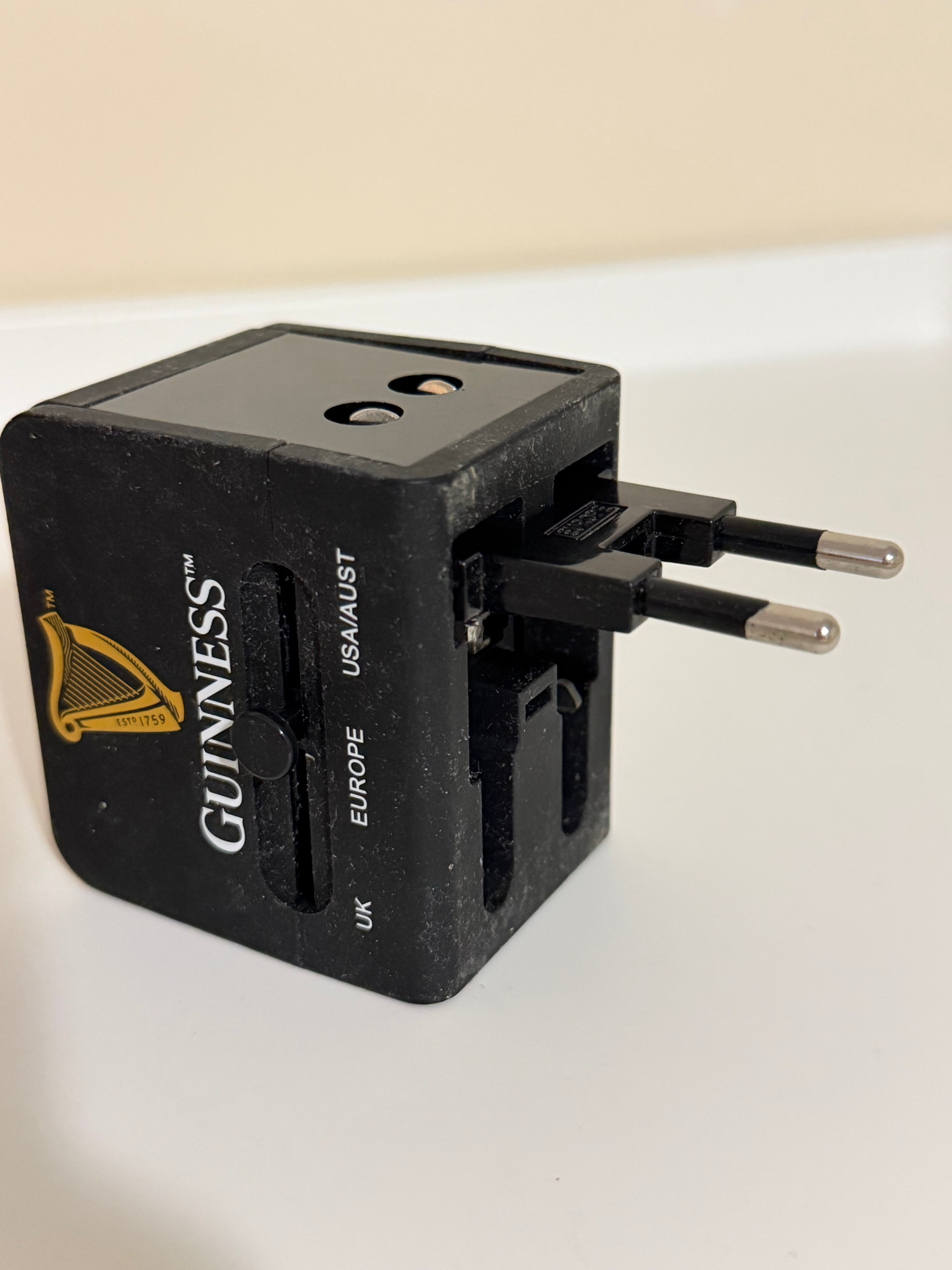 Guinness Universal Travel Adapter with Dual USB Ports - photo 3