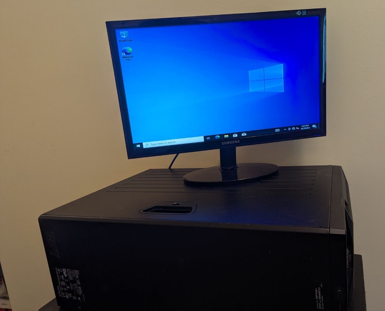 Dell T410 server and monitor, pre-installed with Windows 10.