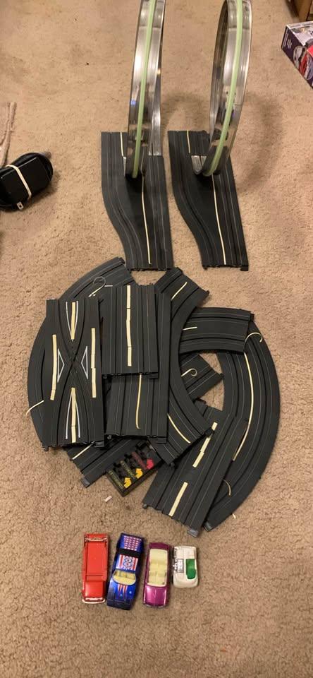 Slot Car Racing Track Set with loops and 4 Cars - glow in the da