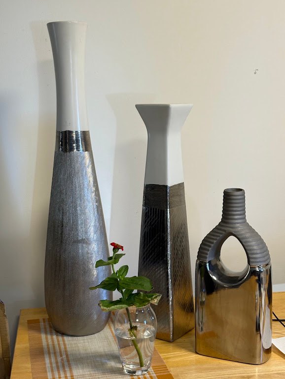Two vases and candle stand