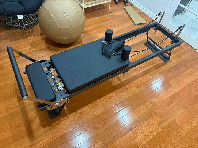 GYMAX Pilates Reformer Machine 660LBS Foldable Home Gym - photo 2