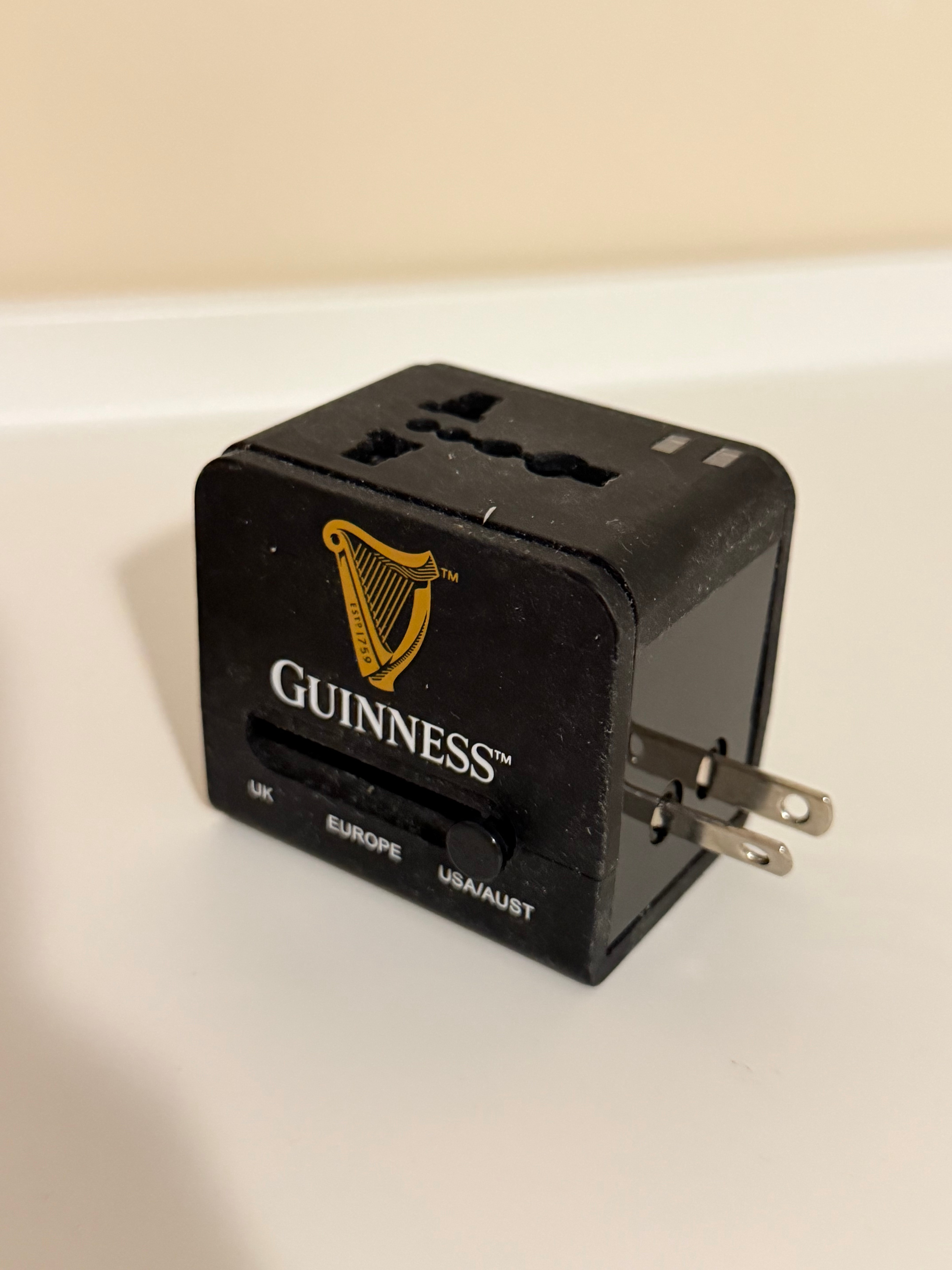 Guinness Universal Travel Adapter with Dual USB Ports - photo 4