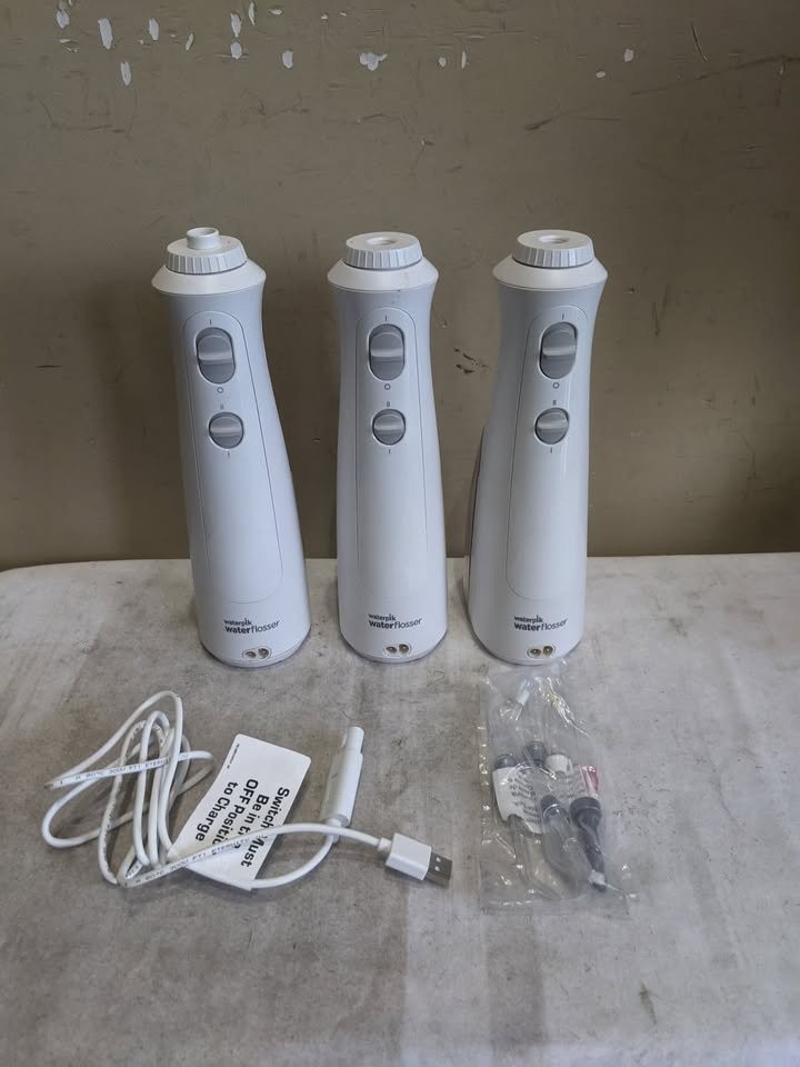 Waterpik Rechargeable Water Flosser with 5 NEW Flossing Tips - photo 3