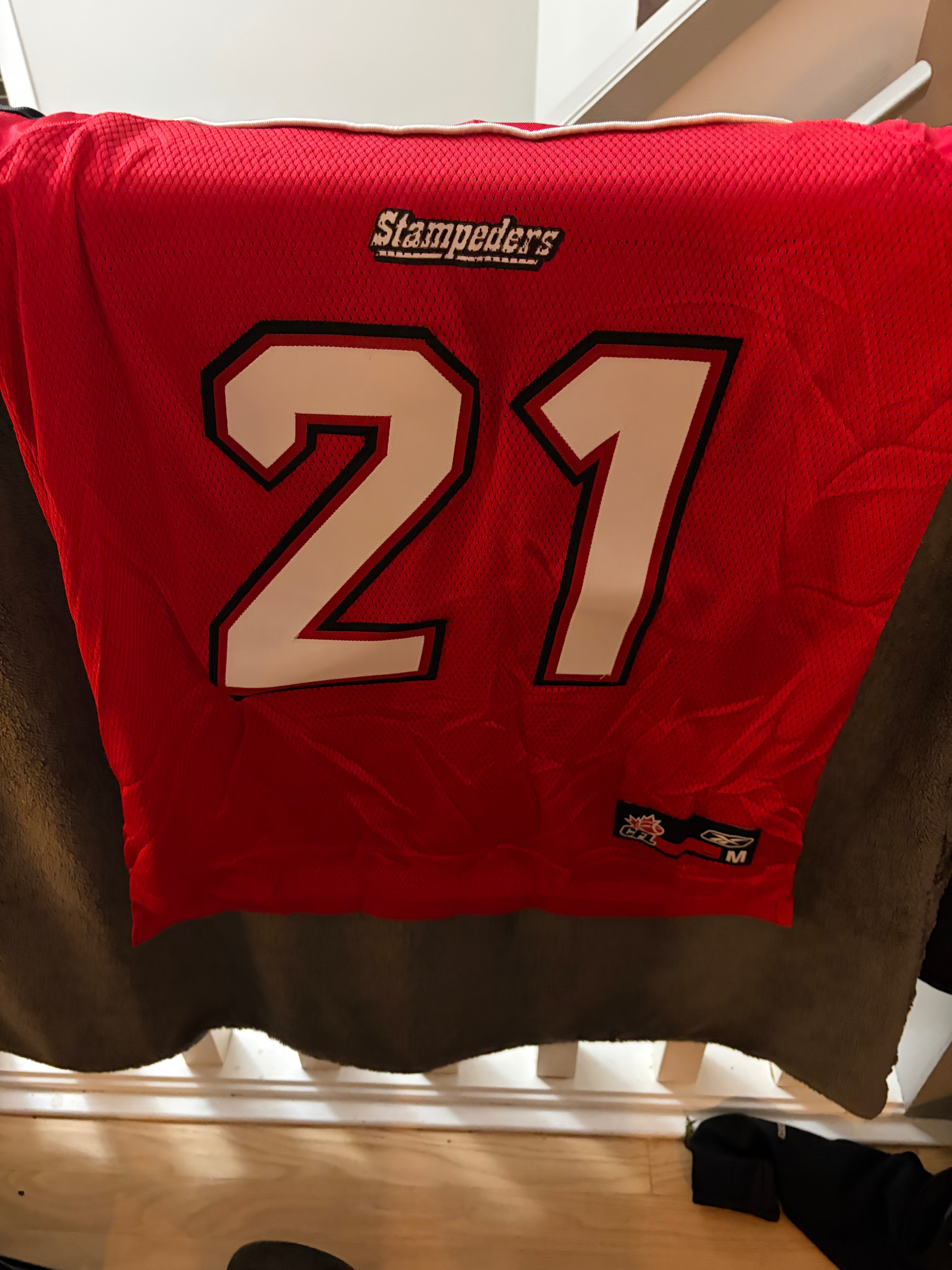 Autographed Calgary Stampeders Jersey Reynolds #21