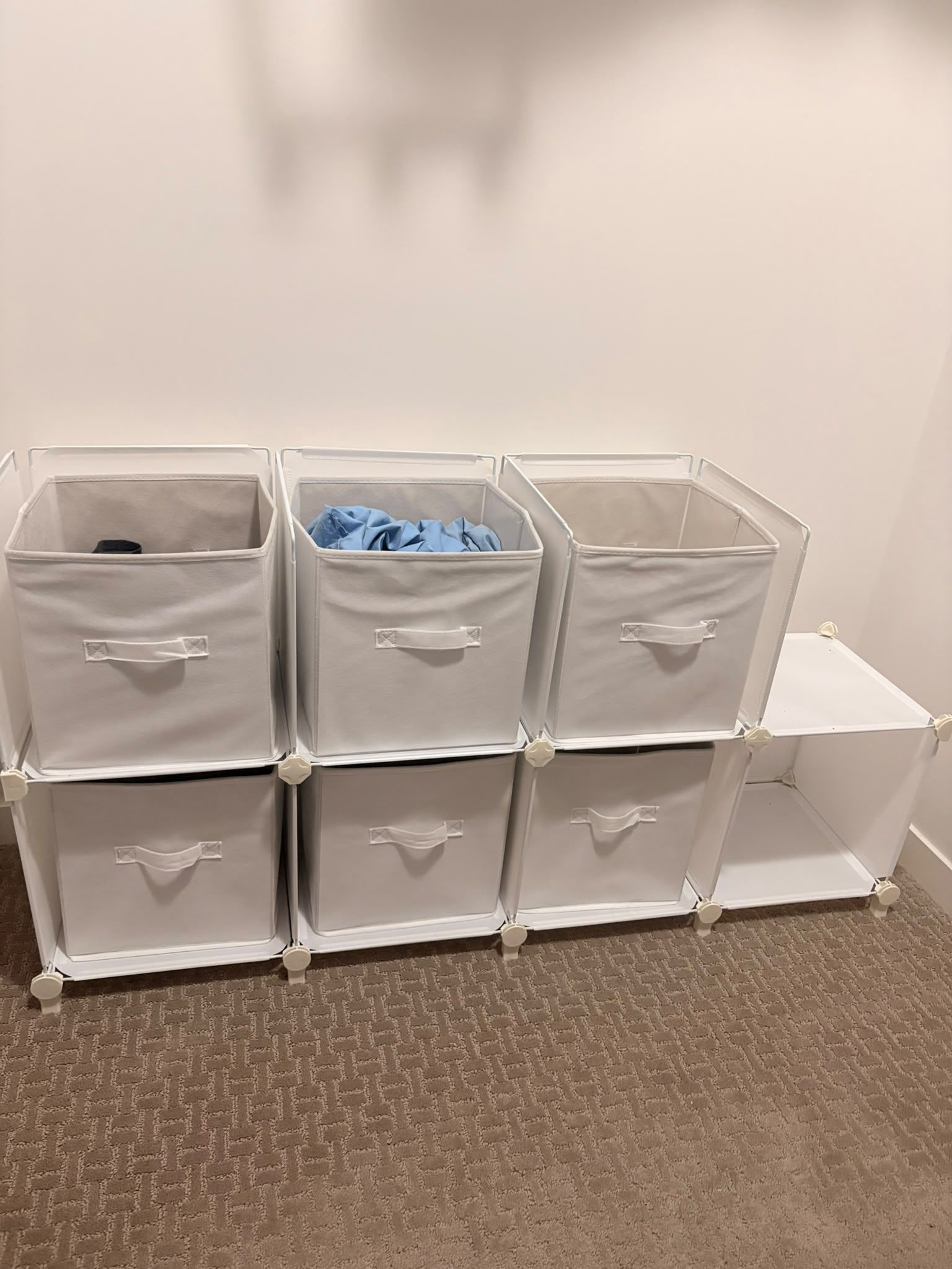 White 8-cube storage organizer with 7 fabric bins