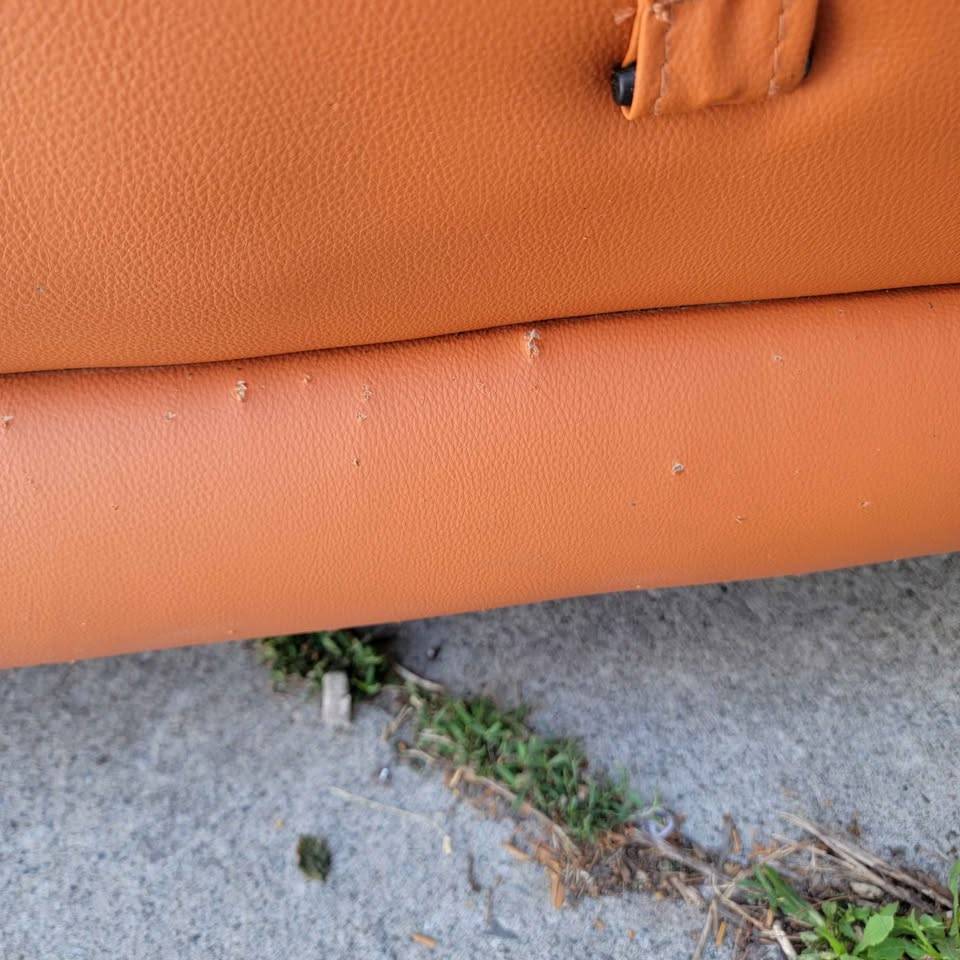 Orange vinyl single sofa, cat claw punctures - photo 3