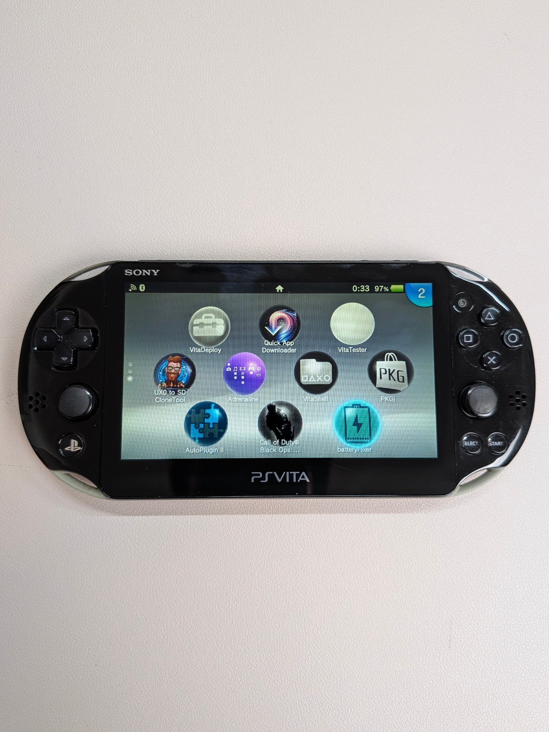 PS Vita 2000 Army Green, Charger + 64GB Card