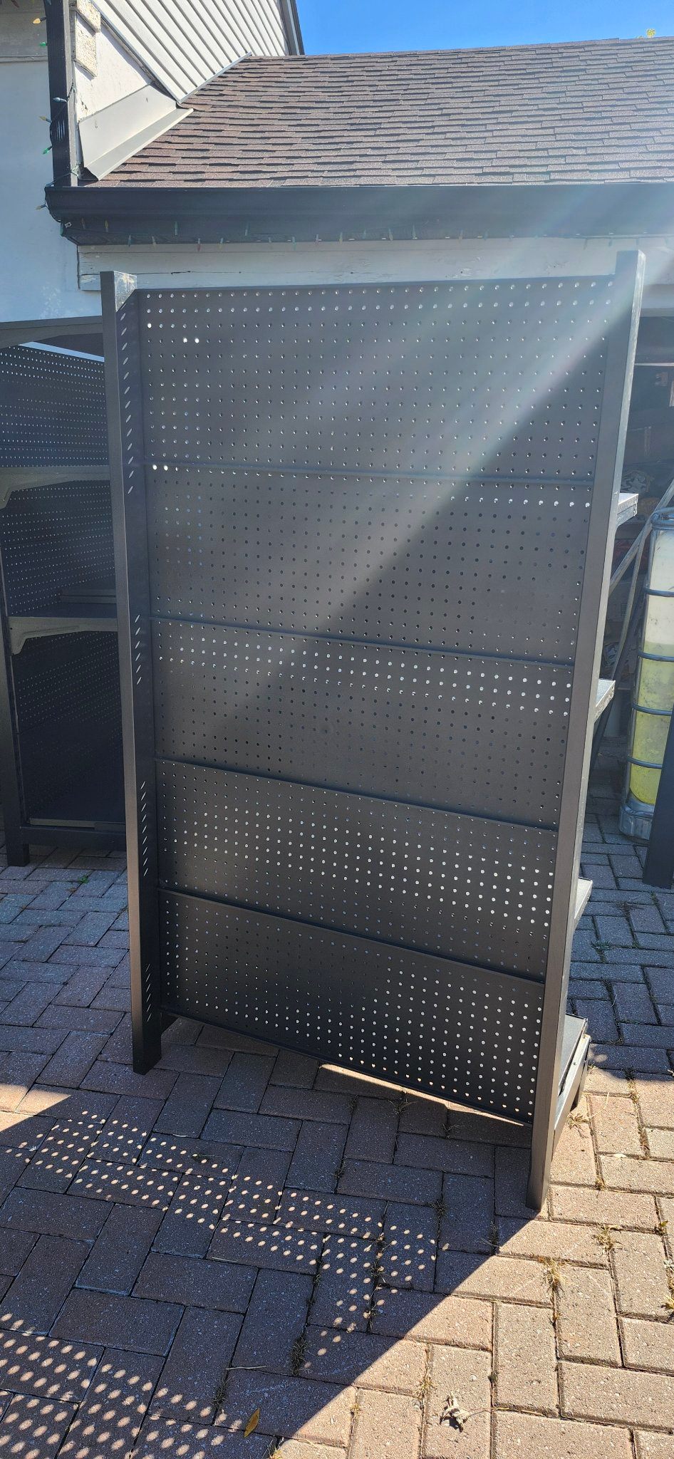 Black metal retail display shelving with pegboard back - photo 3