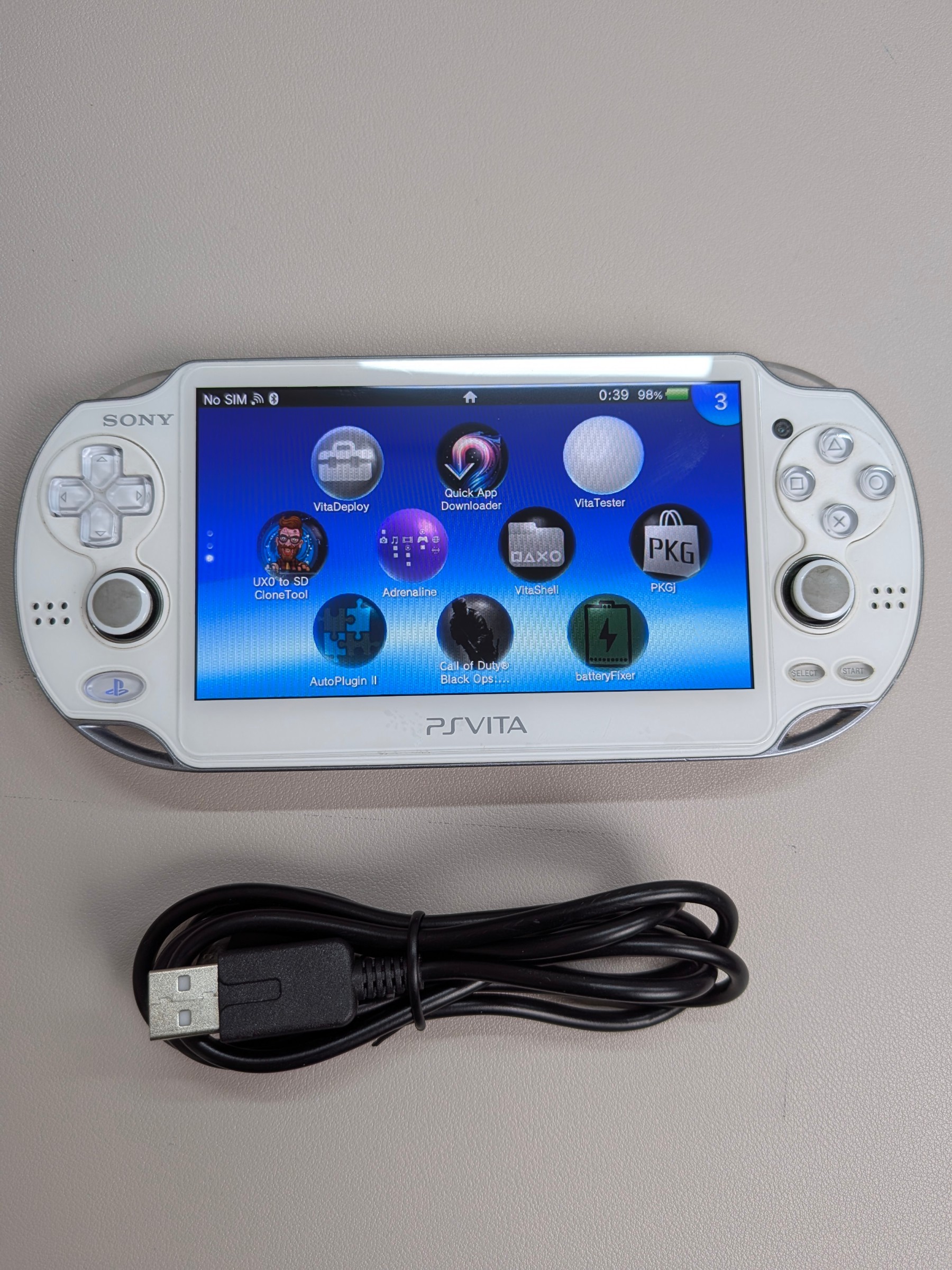 PS Vita 1000 White, Charger + 128GB Card - photo 5