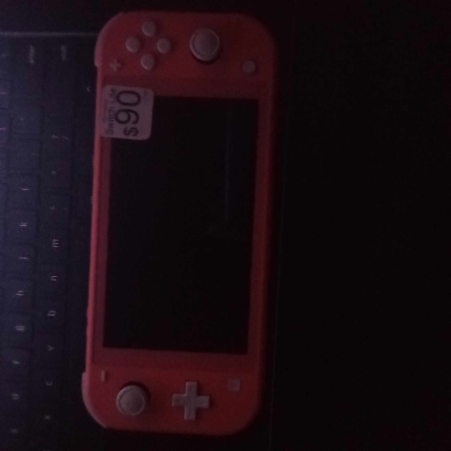Nintendo Switch Lite Coral (Trade or sell)