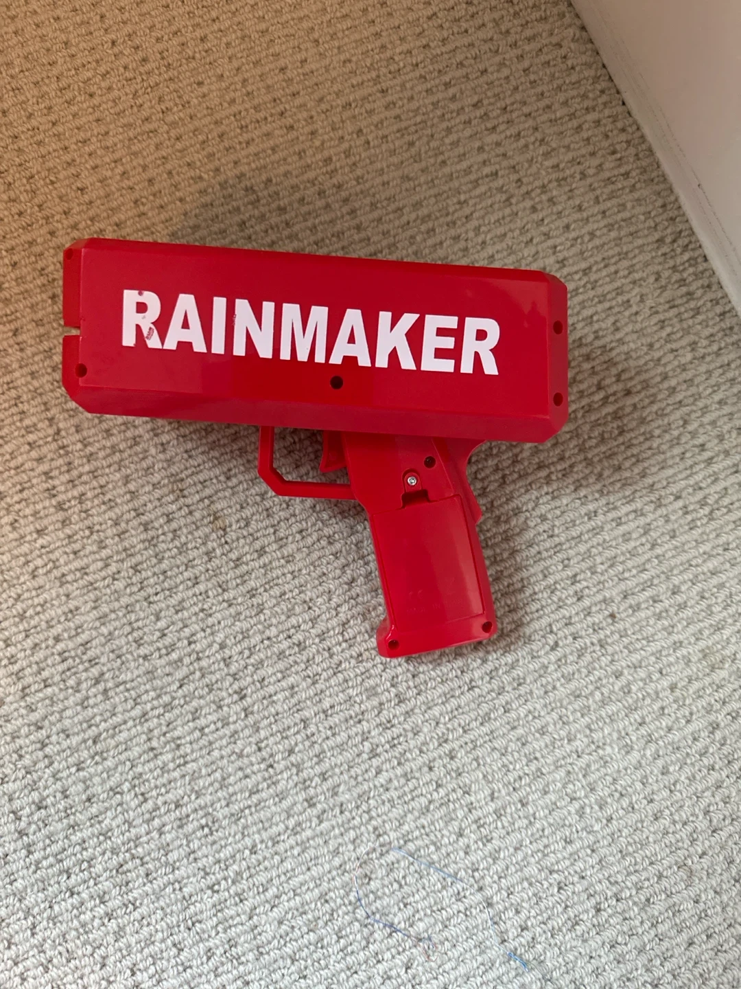 Red RAINMAKER toy gun