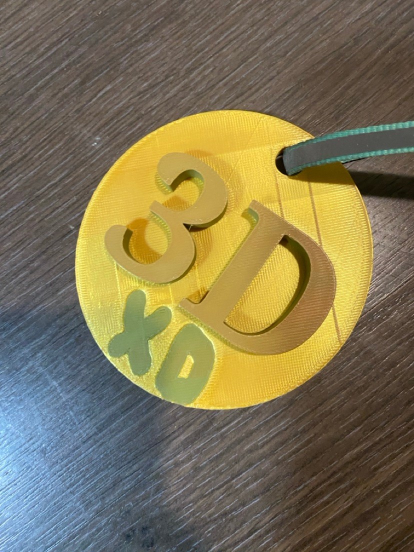 3D Printed "3D XO" Round Ornament – Yellow Hanging Tag
