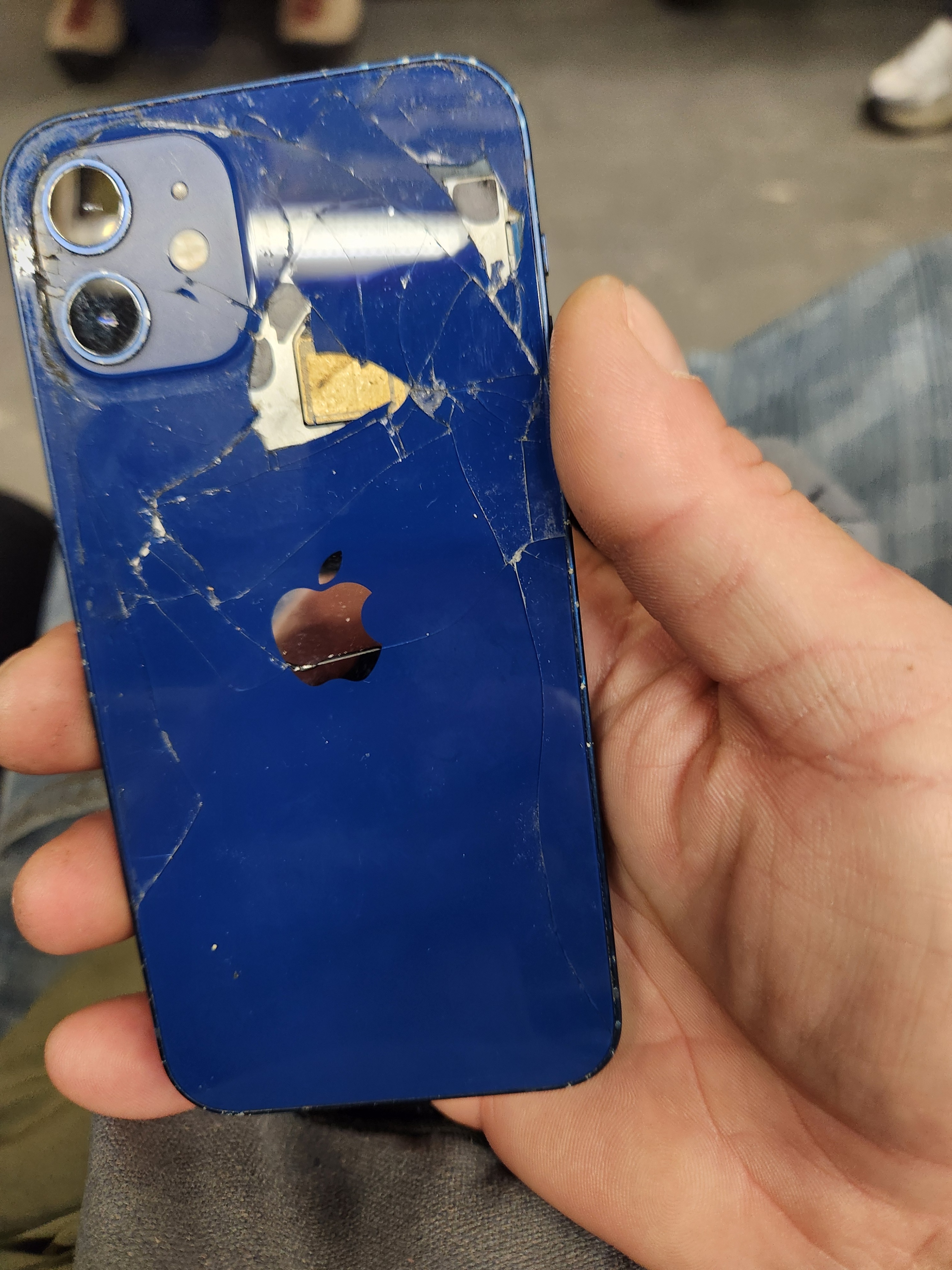 Blue iPhone 12 with cracked screen and back - photo 2