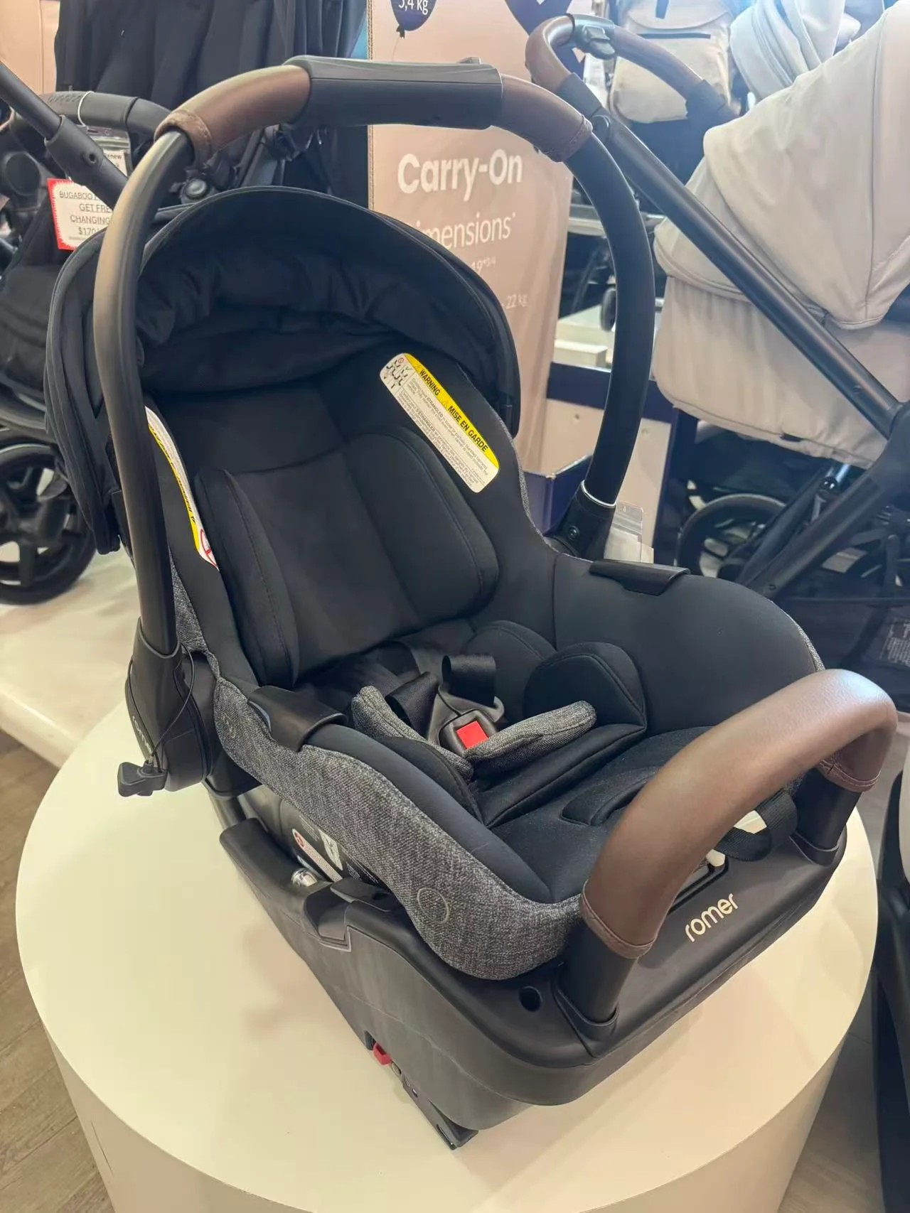 Romer Juni Infant Car Seat Peppercorn Floormodel Now $375