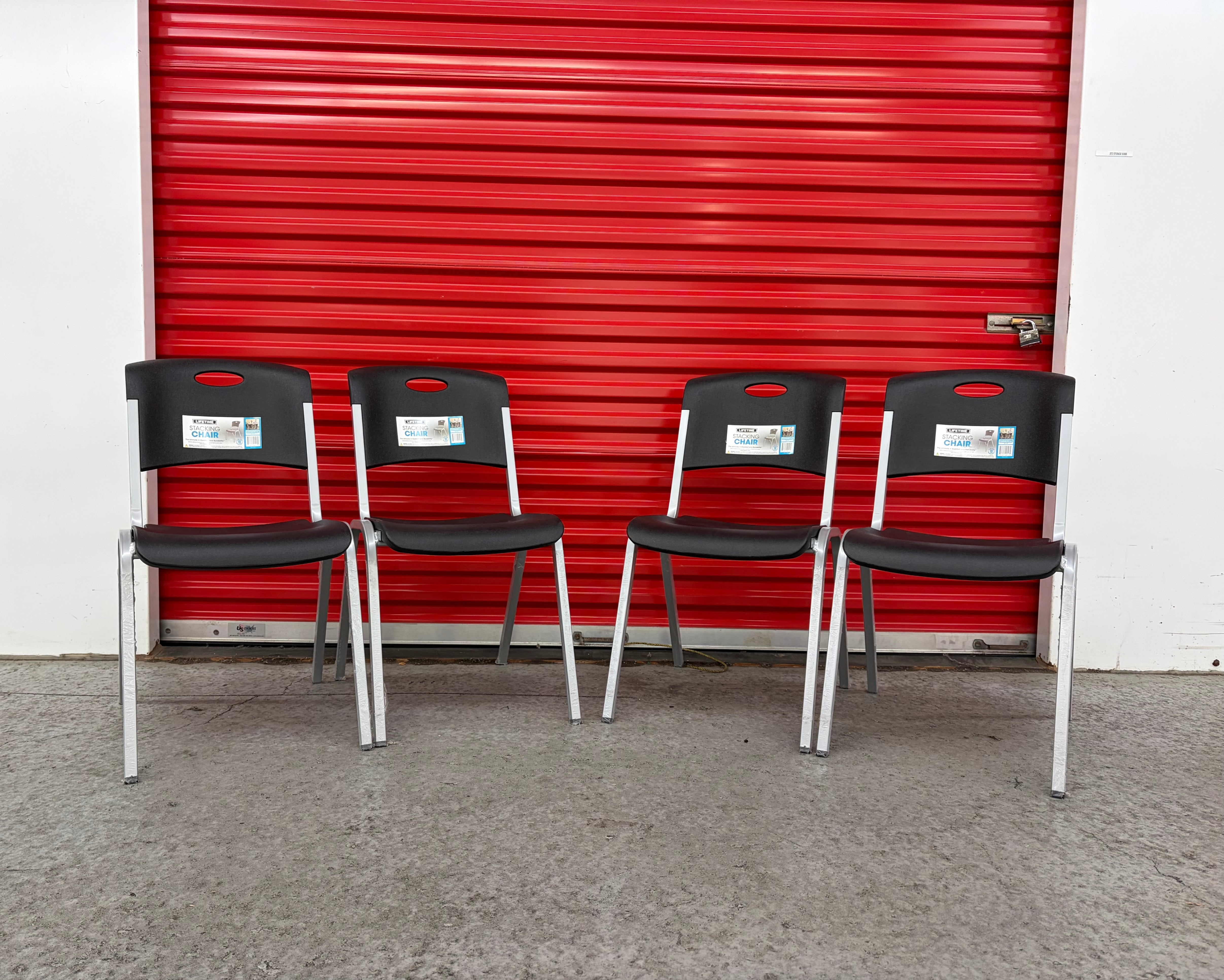 Brand New!!! Stack chairs. Set of 4