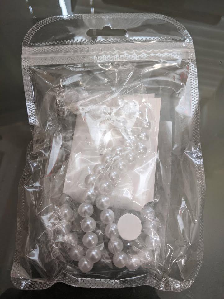 golden saturn pearl necklace