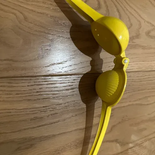 Yellow Handheld Citrus Juicer
