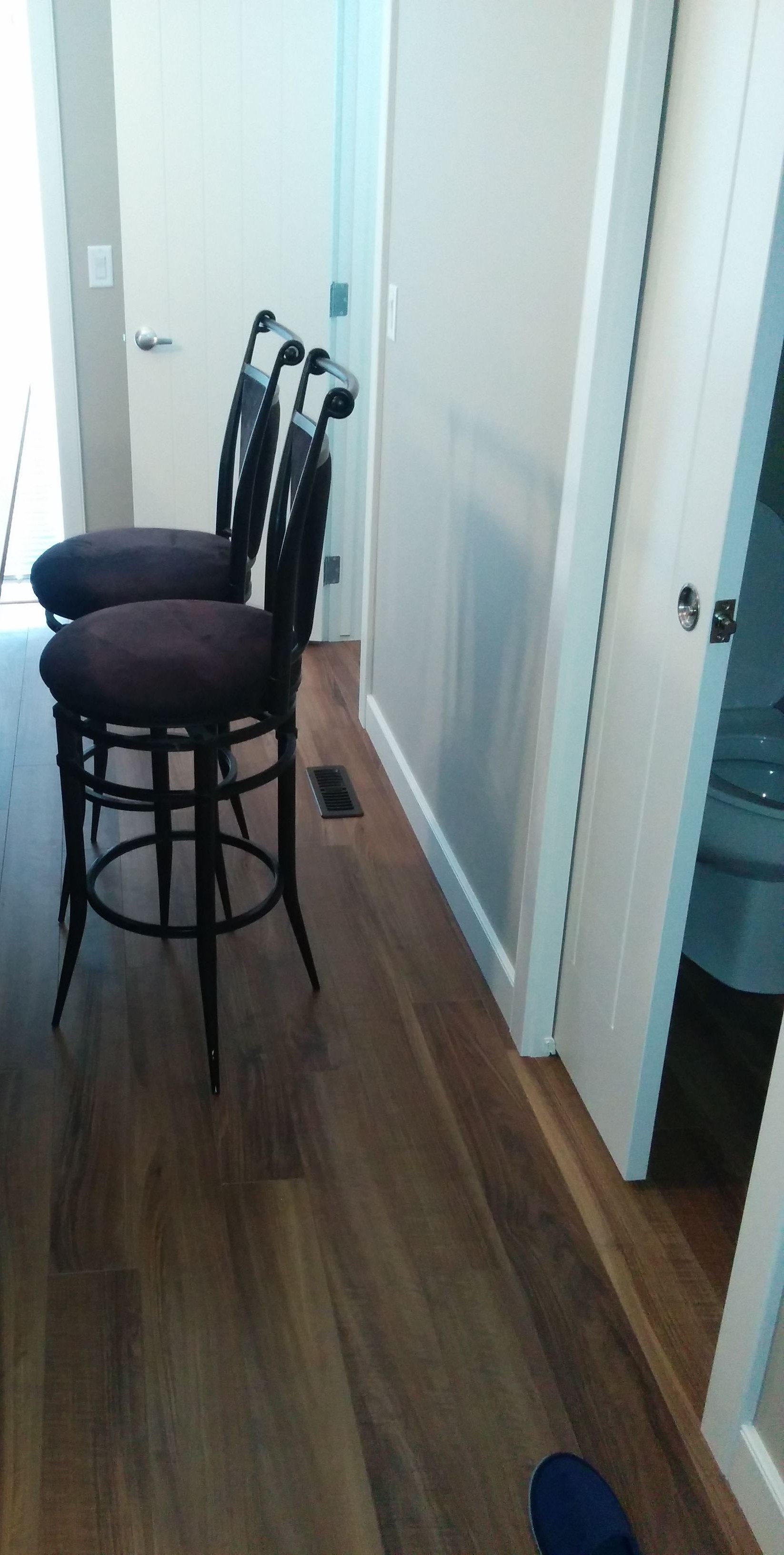 Set of two black metal bar stools