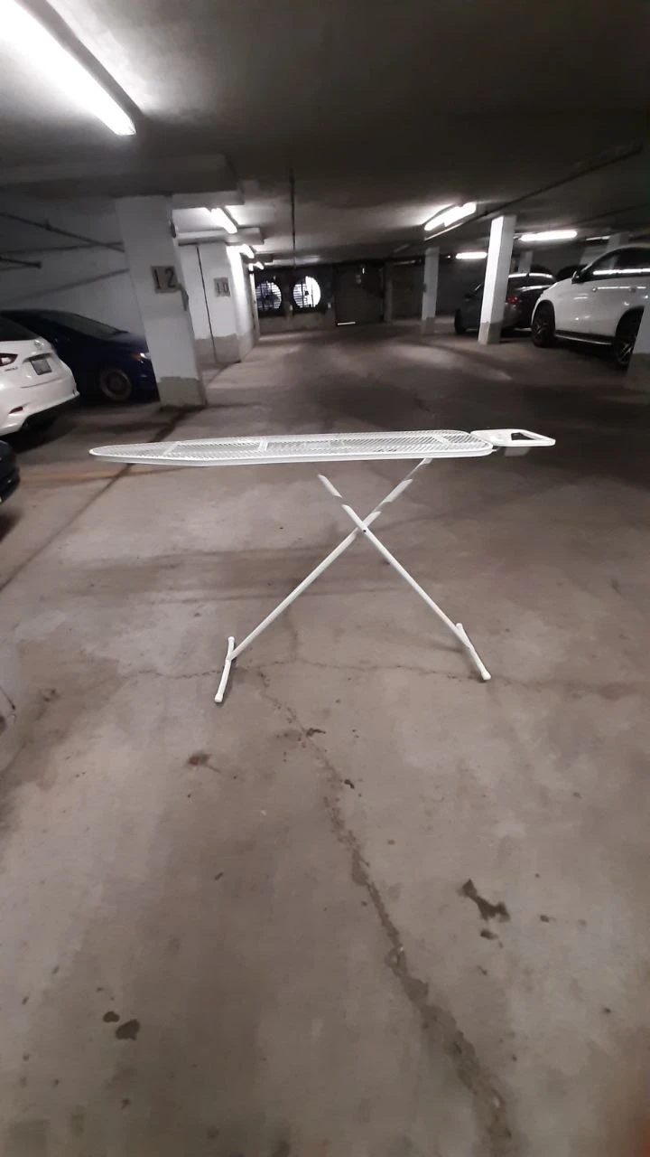 White Metal Ironing Board With New Cover
