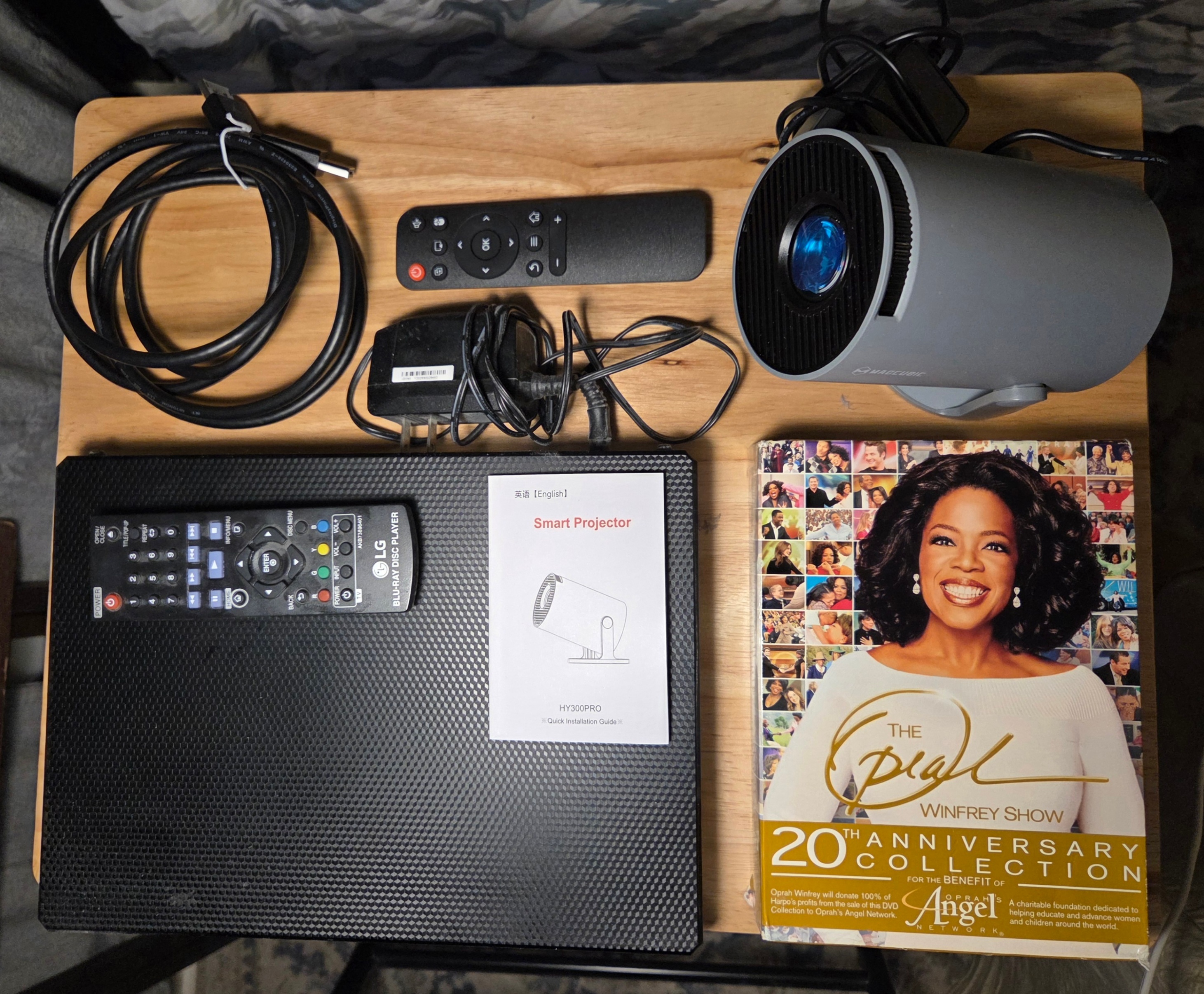 LG DVD/Blue Ray Player, Magcubic Projector, Oprah DVD Collection
