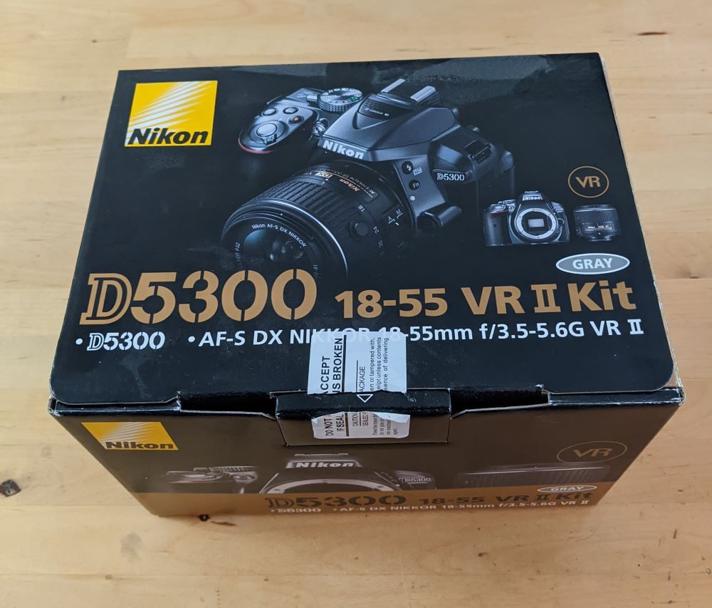 Nikon D5300 Camera + a professional tripod & other accessories