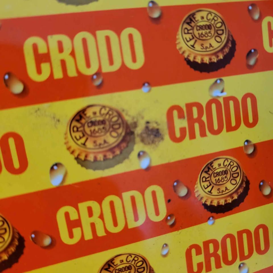 vintage Crodo metal advertising tray featuring a repeating - photo 2