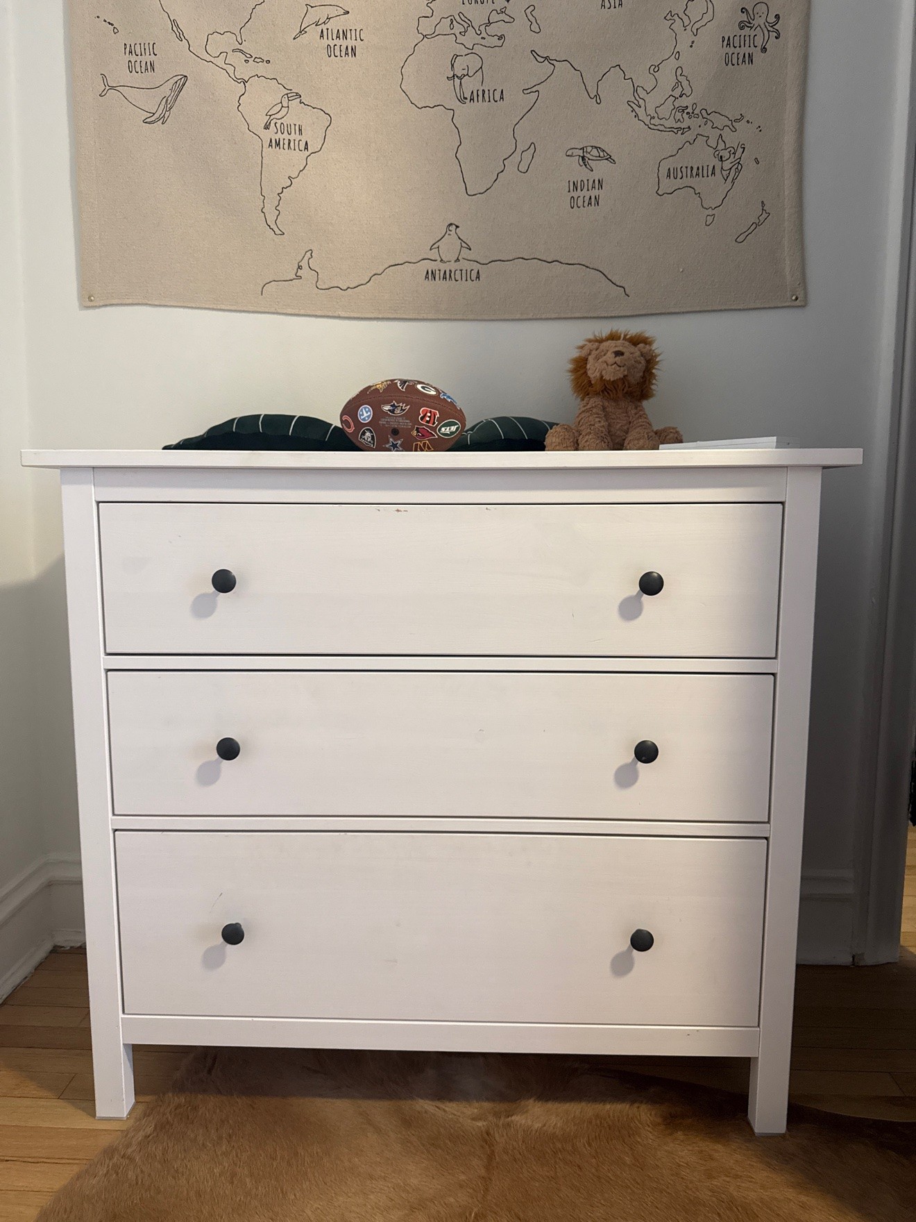 IKEA white 3-drawer dresser with black knobs