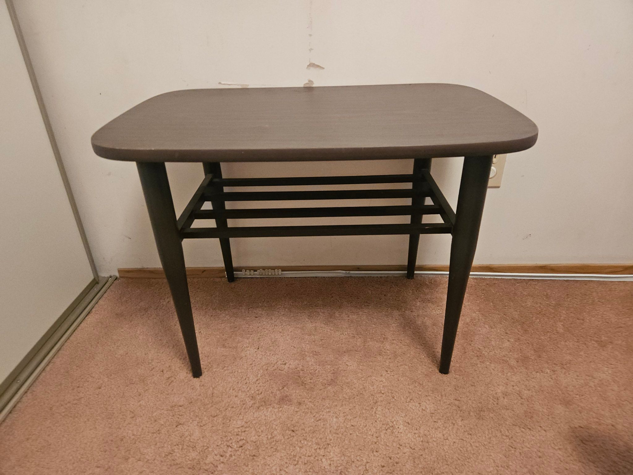 Dark Brown Oval Table with Lower Shelf