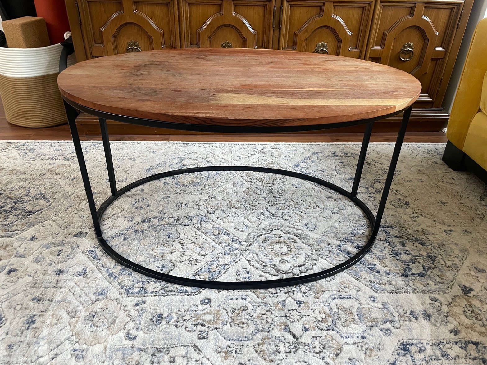 Oval wood-top coffee table