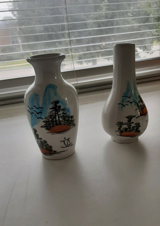 Pair of Asian-inspired ceramic vases $25 each