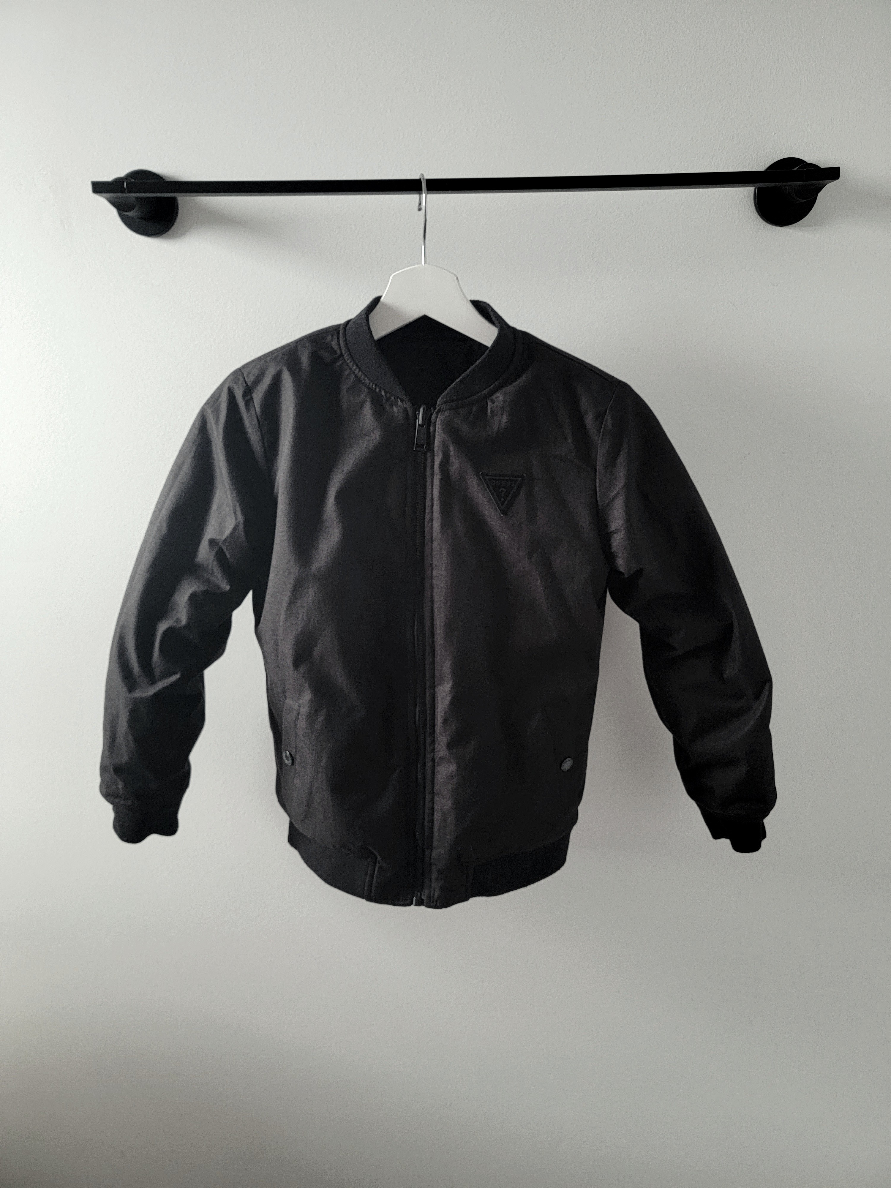 Kids Guess reversible bomber jacket measurements in ad