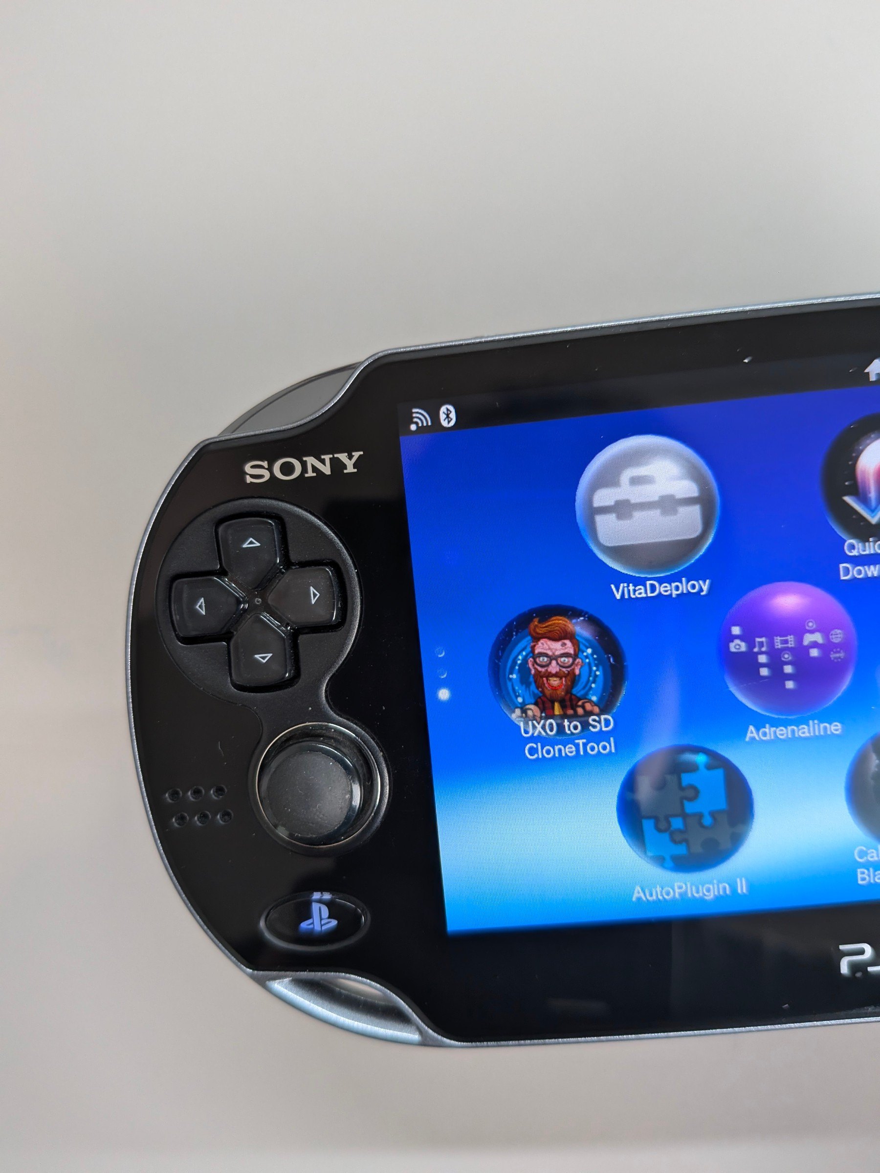 PS Vita 1000 Black Like-New, Charger + 64GB Card - photo 3