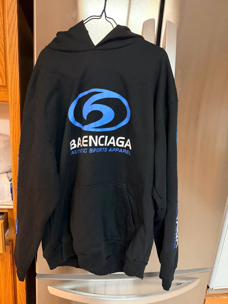Black Hoodie with Blue Sports-Style Graphic