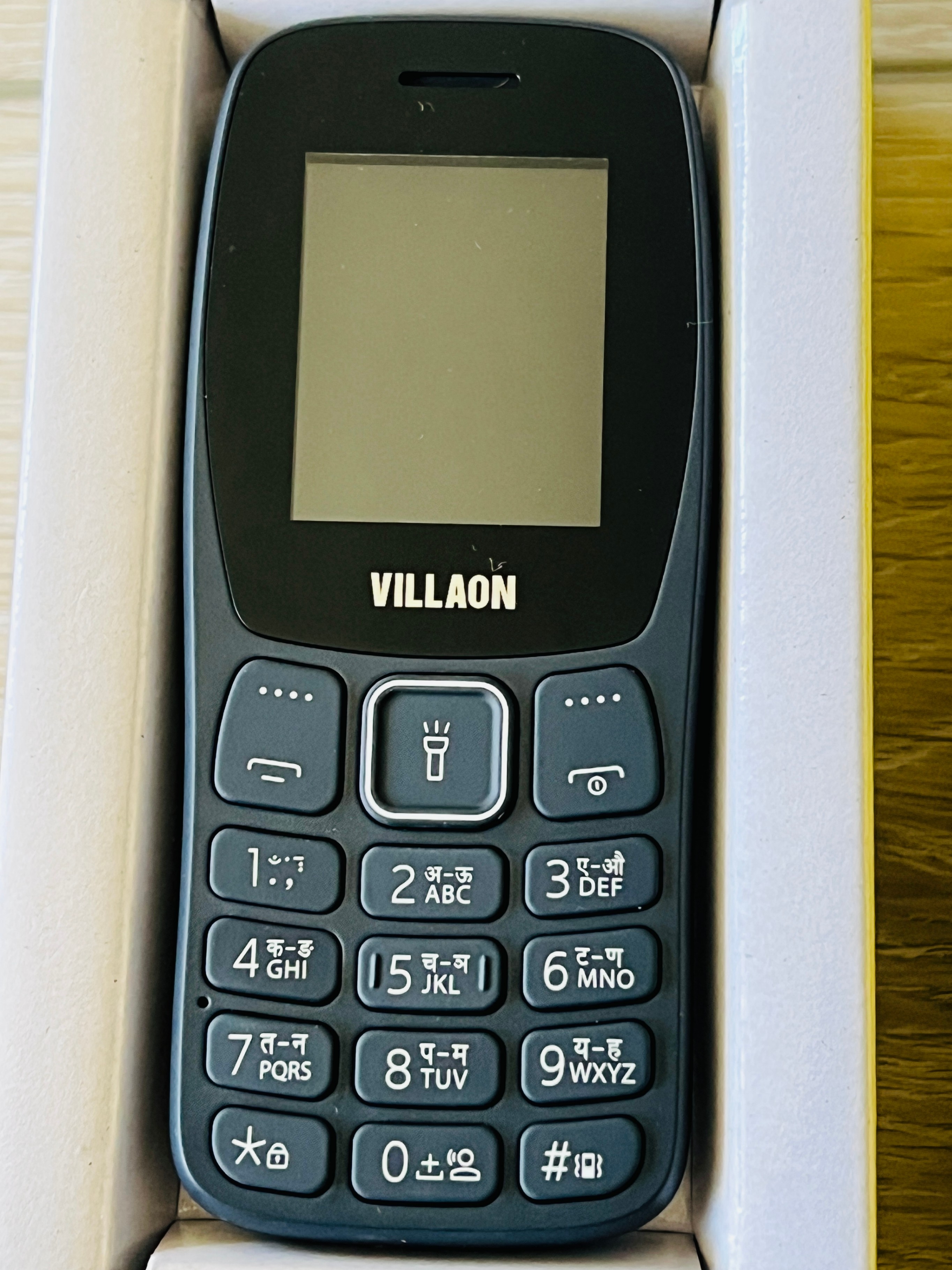 Keypad phone with charger (New)