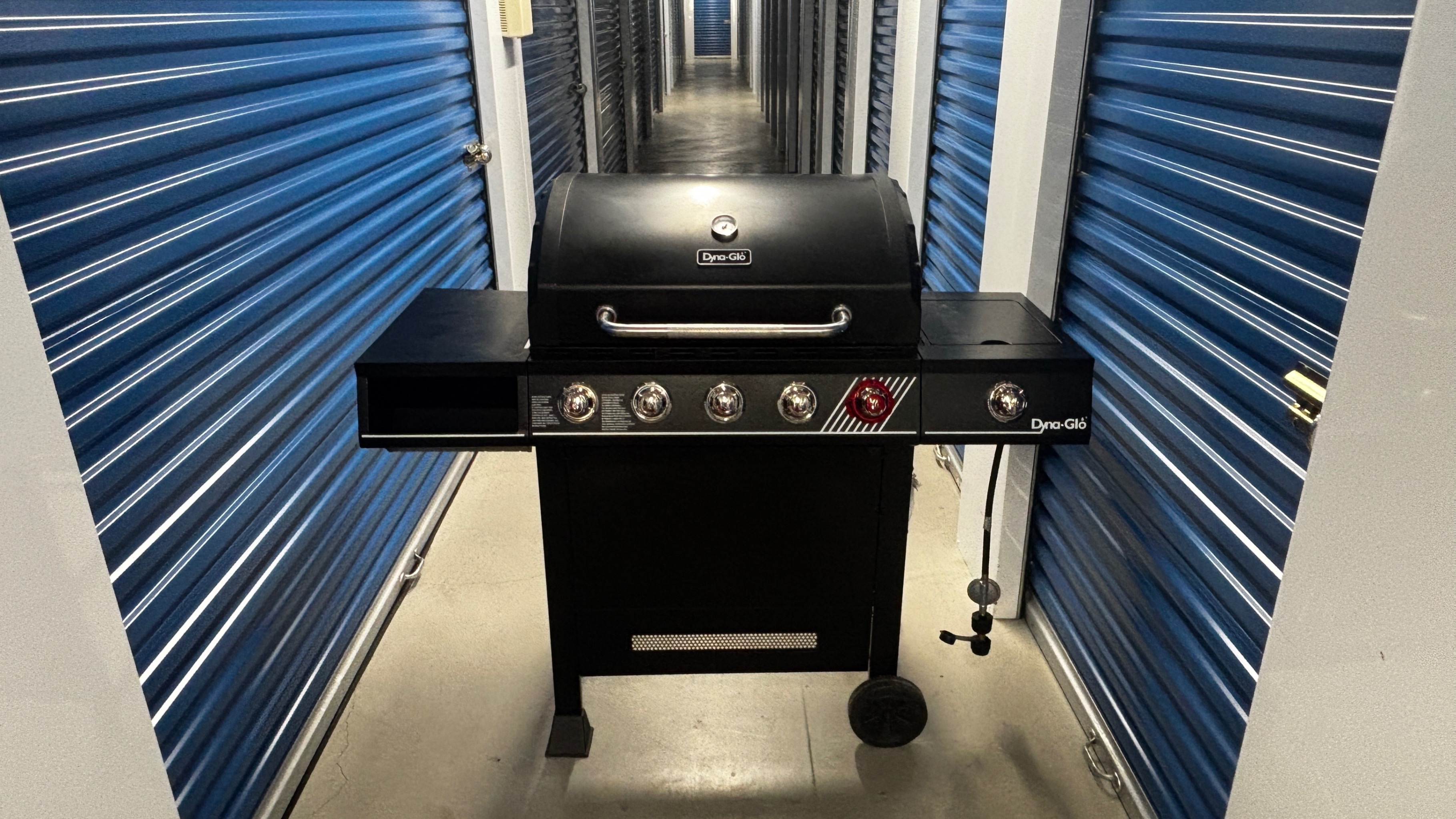 Lightly Used 4-Burner BBQ with sear station and side burner.