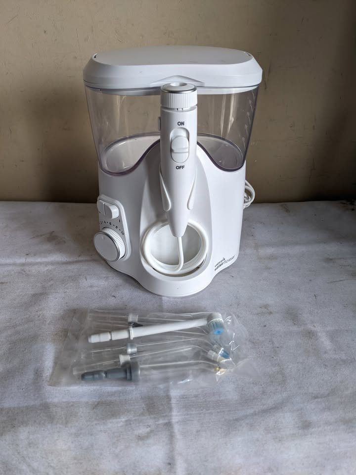 Waterpik Ultra PLUS Water Flosser Includes 6 NEW Tips