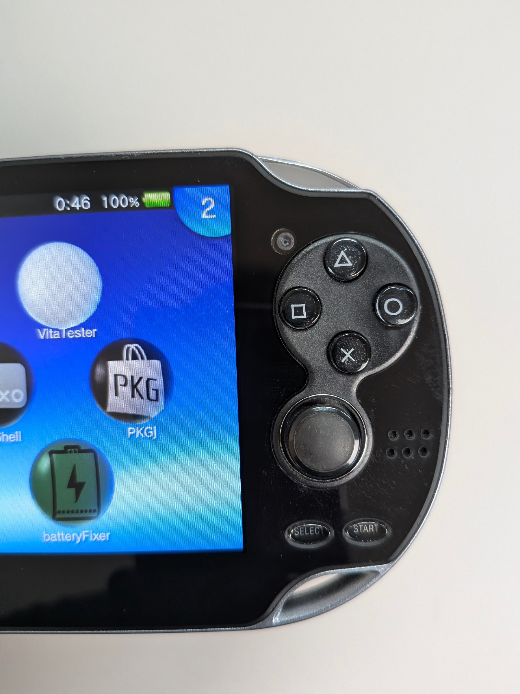 PS Vita 1000 Black Like-New, Charger + 64GB Card - photo 4
