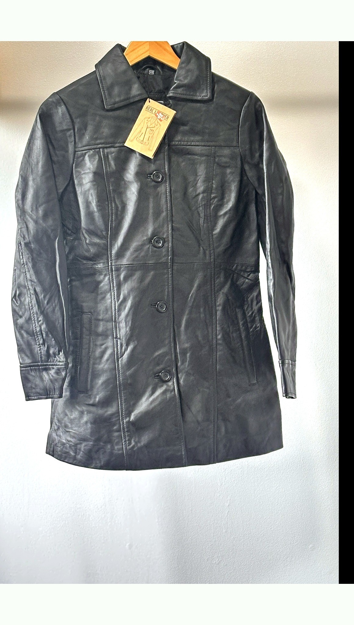 Women's black leather coat — brand new, size XS