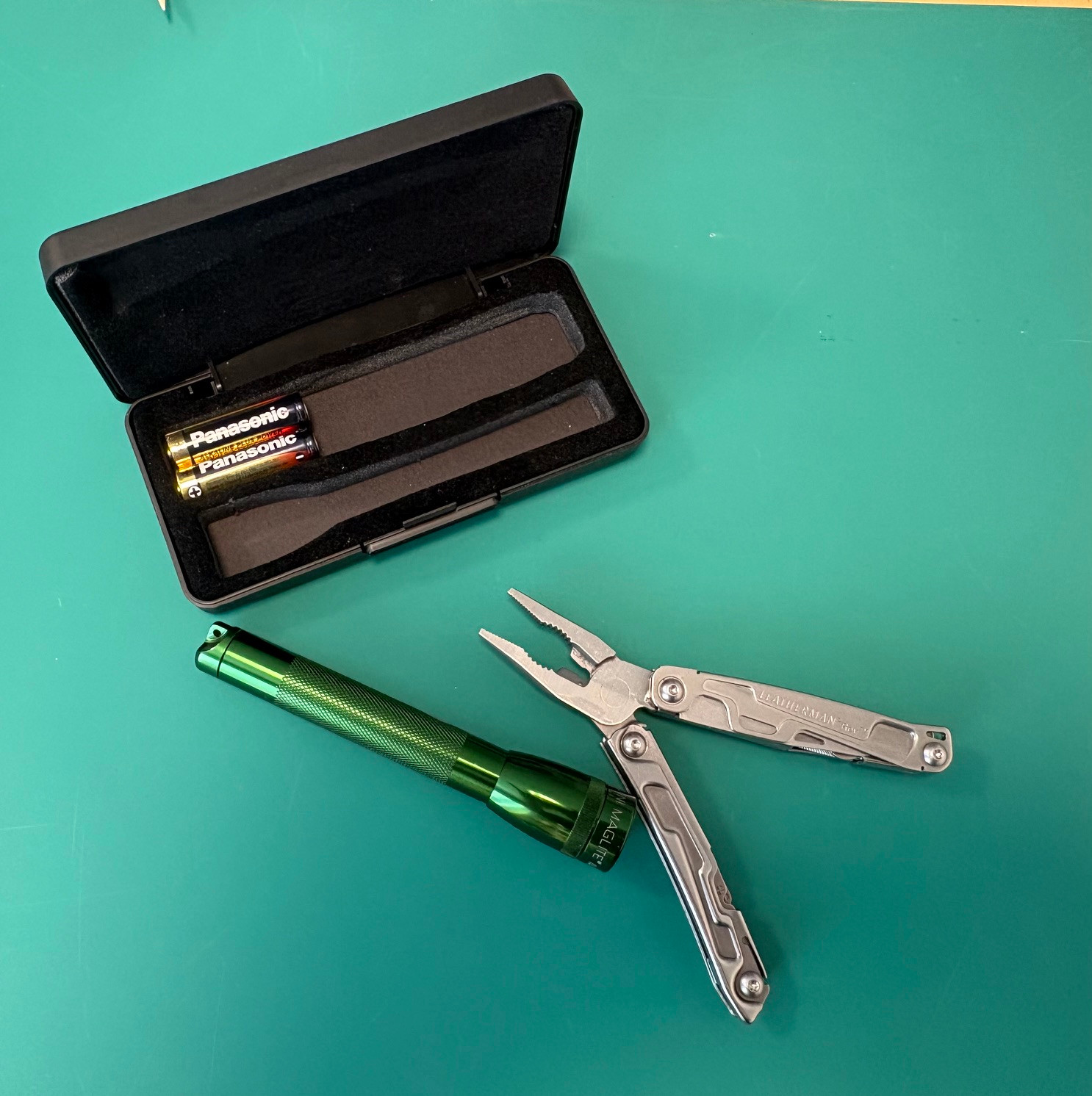 Leatherman with  Mini Maglite