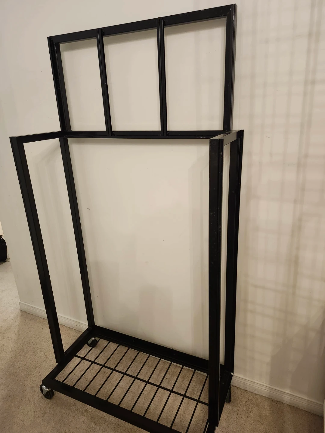Black Metal Garment Rack with Wheels