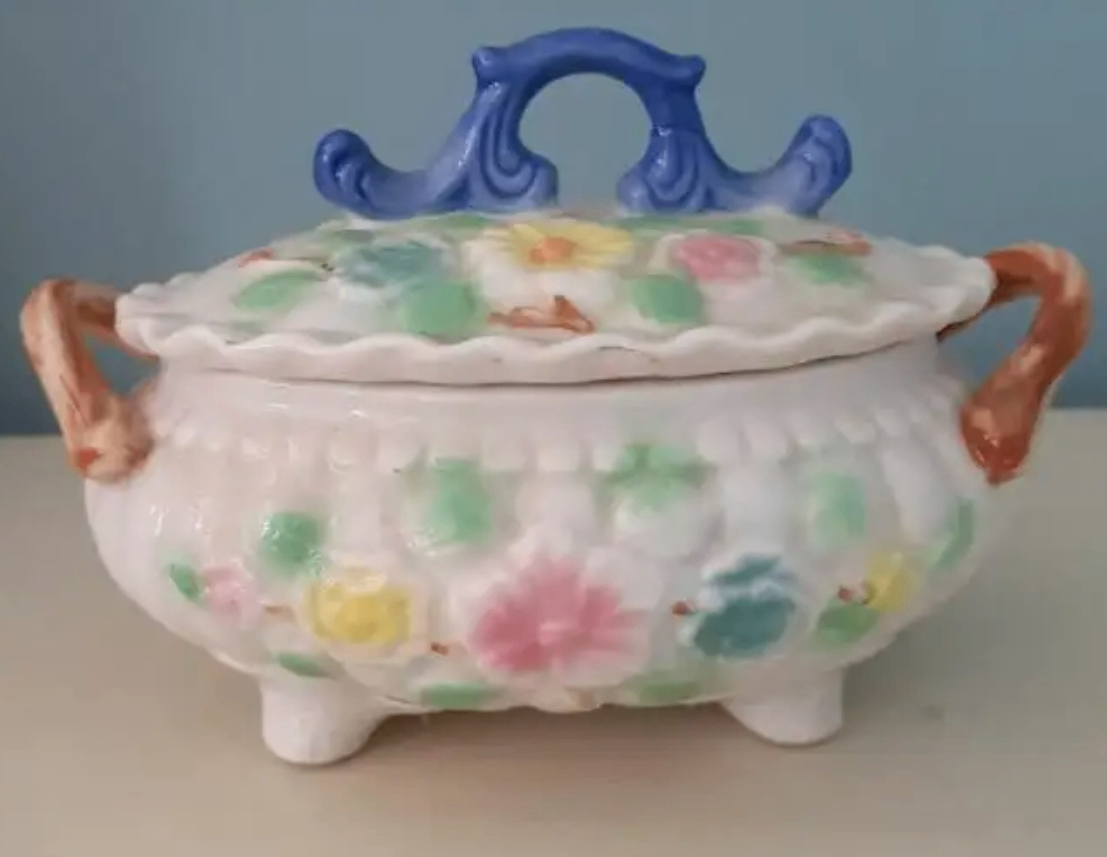 Vintage porcelain lidded hand painted floral trinket box