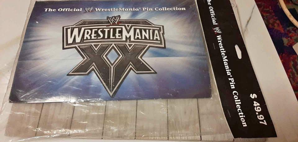 The official wrestlemania lapel Pin collection sealed 2004