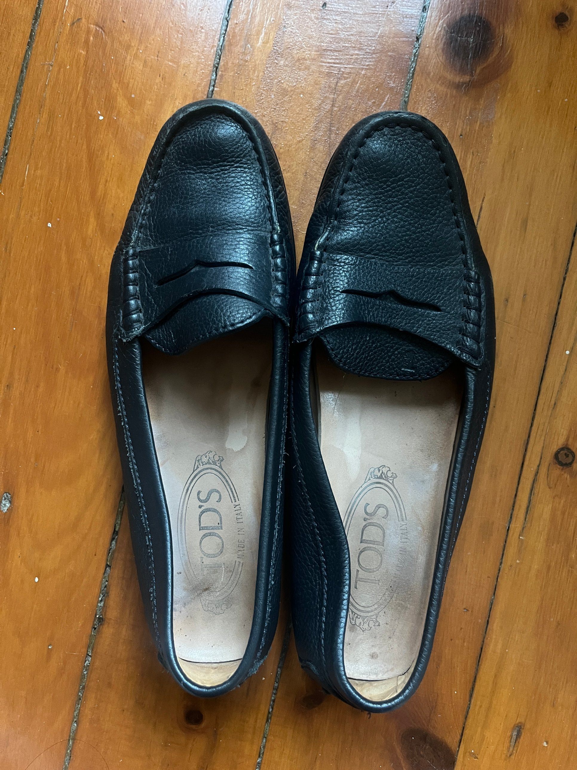 Tod's navy leather penny loafers