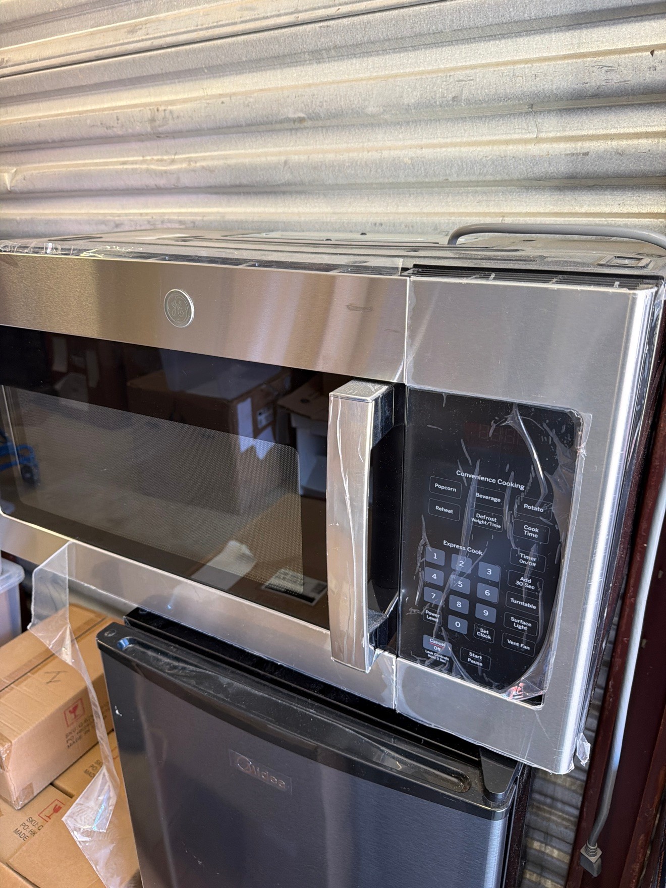 GE JVM3160RF9SS 1.6 cu ft Over-Range Microwave SS — New - photo 4