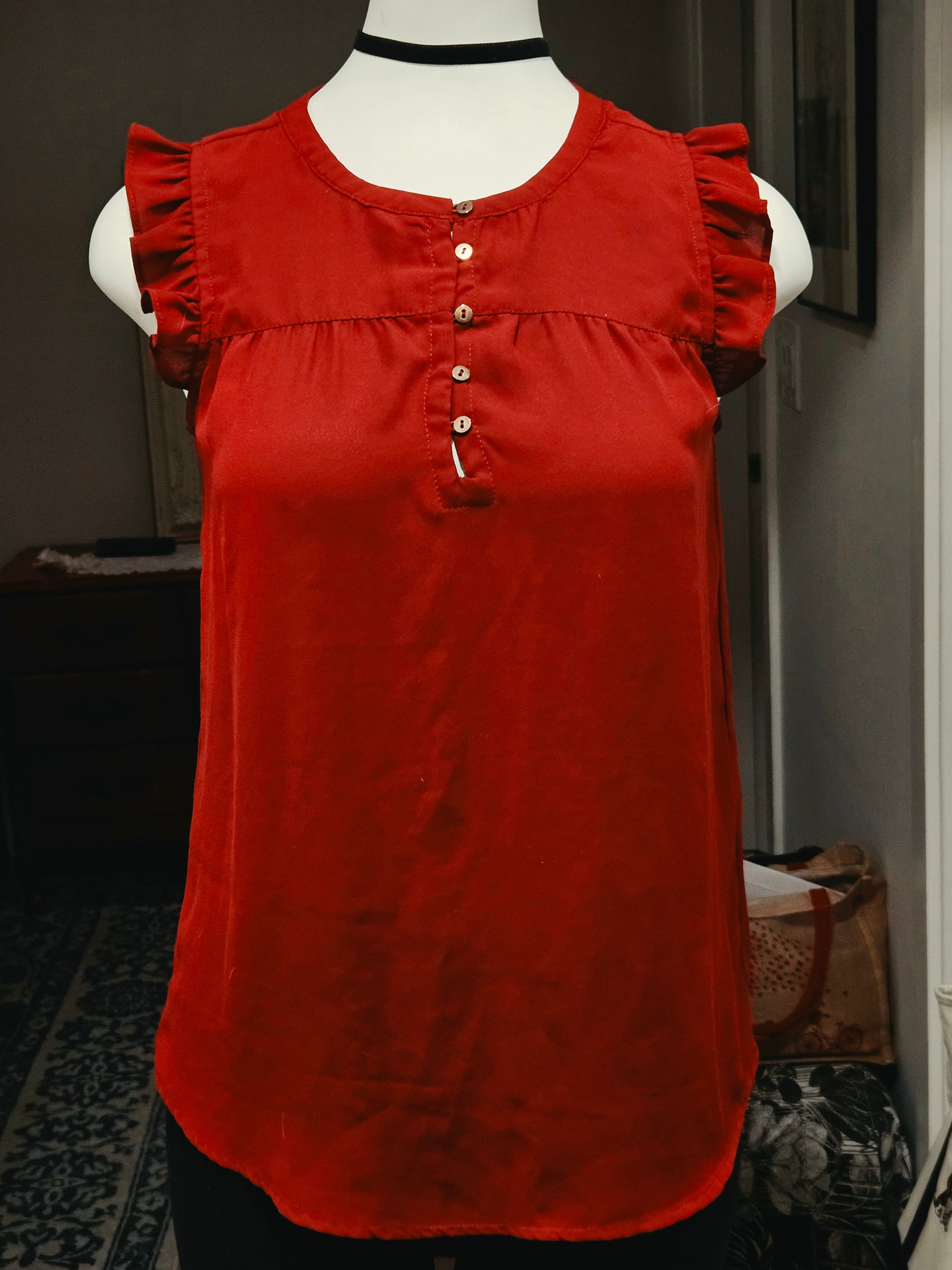 red ruffled blouse