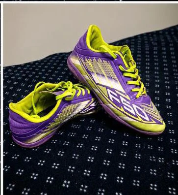 Purple and Lime Green Soccer Cleats
