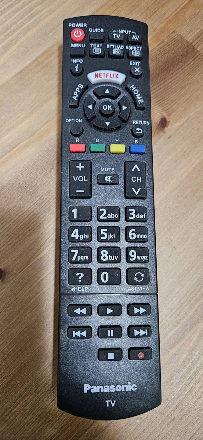 3 Remote Controls: Rogers, Panasonic, and Fire TV - photo 2