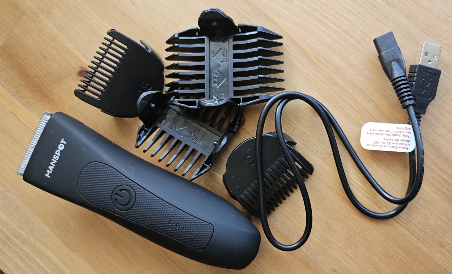 MANSPOT Body Trimmer with 5 Guide Combs & USB Cable - photo 2