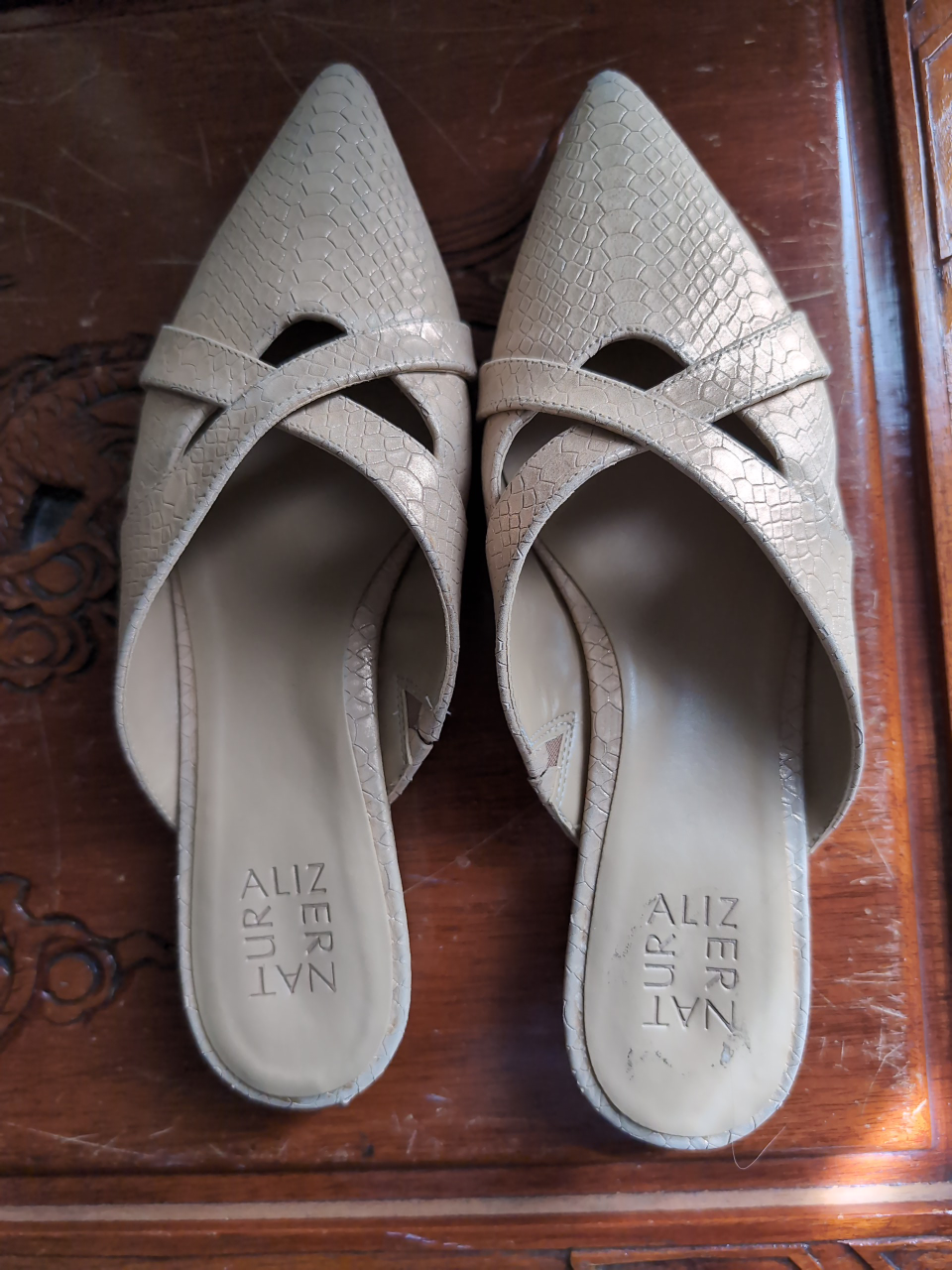 Gold snake print mules by Naturalizer